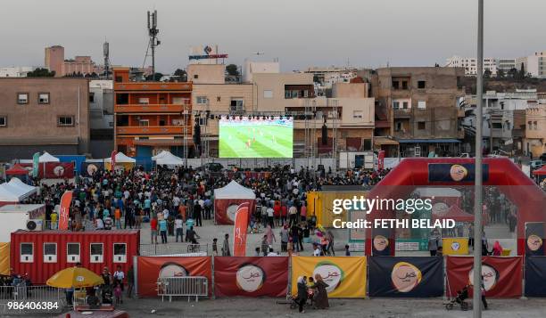 Tunisian football fans watch the Russia 2018 World Cup Group G match between Tunisia and Panama in the impoverished neighborhood of El-Mellassine in...