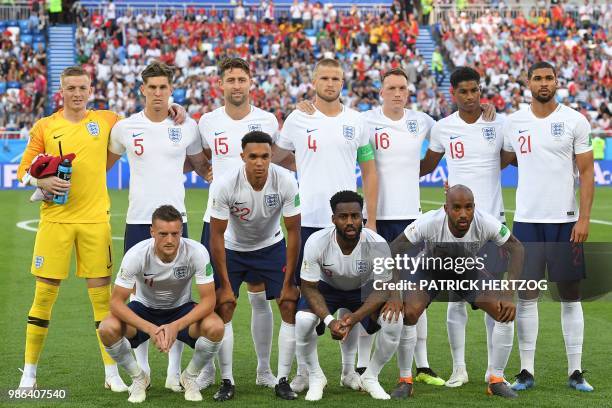 England's goalkeeper Jordan Pickford, England's defender John Stones, England's defender Gary Cahill, England's midfielder Eric Dier, England's...