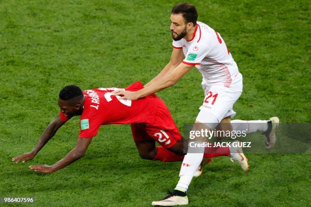 Panama's midfielder Jose Luis Rodriguez fights for the ball with Tunisia's defender Hamdi Nagguez during the Russia 2018 World Cup Group G football...