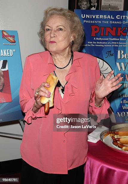 Actress Betty White unveils the "Naked" hot dog at Pink's Hot Dogs at Universal CityWalk on April 19, 2010 in Universal City, California.