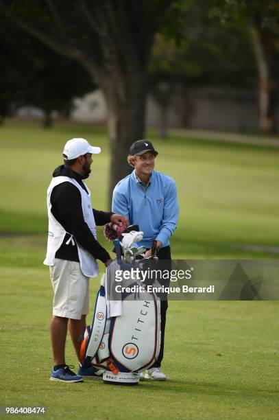 Austin Smotherman of the United States chats with his caddie during the second round of the PGA TOUR Latinoamerica 59º Abierto Mexicano de Golf at...