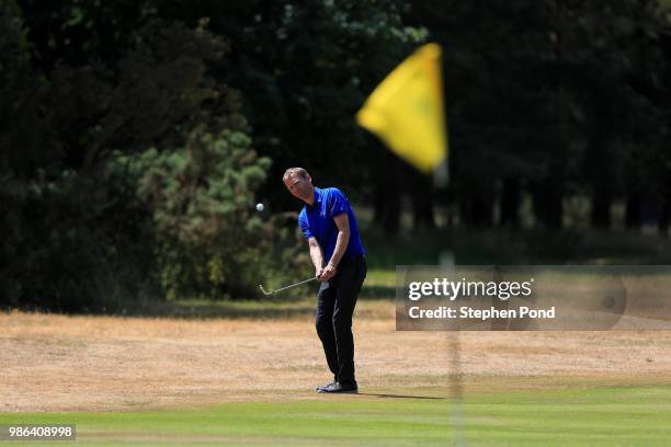 Player chips onto a green during The Lombard Trophy East Qualifing event at Thetford Golf Club on June 28, 2018 in Thetford, England.