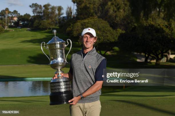 Austin Smotherman of the United States poses with the trophy after winning the PGA TOUR Latinoamerica 59º Abierto Mexicano de Golf at Club Campestre...