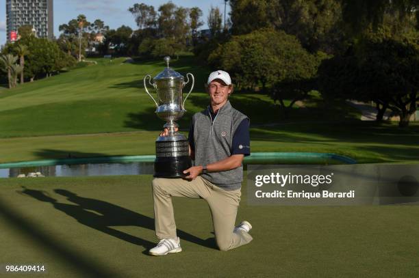 Austin Smotherman of the United States poses with the trophy after winning the PGA TOUR Latinoamerica 59º Abierto Mexicano de Golf at Club Campestre...