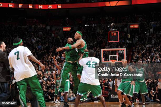 Paul Pierce and Nate Robinson of the Boston Celtics celebrate against the Miami Heat in Game Three of the Eastern Conference Quarterfinals during the...