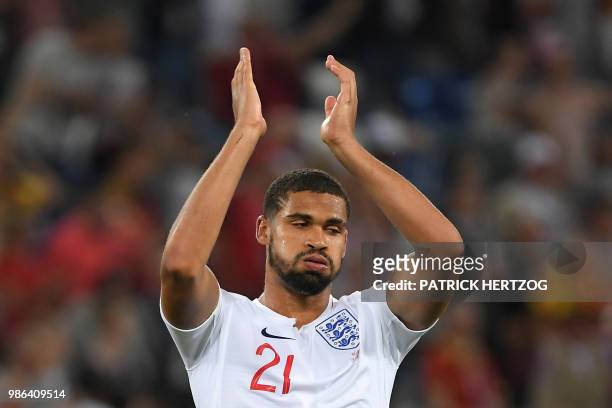 England's midfielder Ruben Loftus-Cheek applauds at the end of the Russia 2018 World Cup Group G football match between England and Belgium at the...