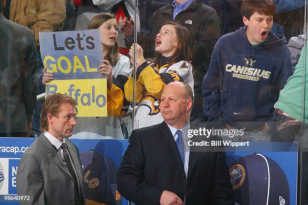 Head coach Claude Julien and assistant coach Geoff Ward of the Boston Bruins leave the bench following their 4-1 loss to the Buffalo Sabres in Game...