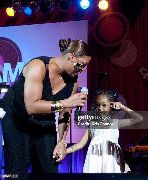 Queen Latifah and Michaele James speak during the Fight For Children's School Night 2010 fundraiser at the Ronald Reagan Building on April 23, 2010...