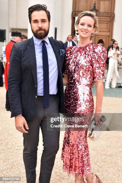 Diego Bivero-Volpe and Charlotte Carroll attend the Elephant Family's Concours d'Elephant Judging gala dinner and auction at The Royal Hospital...