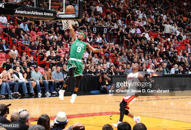 Rajon Rondo of the Boston Celtics shoots against Dwyane Wade of the Miami Heat in Game Three of the Eastern Conference Quarterfinals during the 2010...