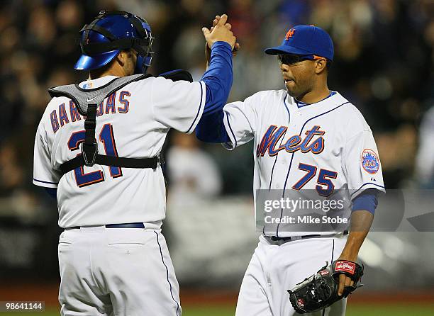 Francisco Rodriguez and Rod Barajas of the New York Mets celebrate after defeating the Atlanta Braves 5-2 on April 23, 2010 at Citi Field in the...