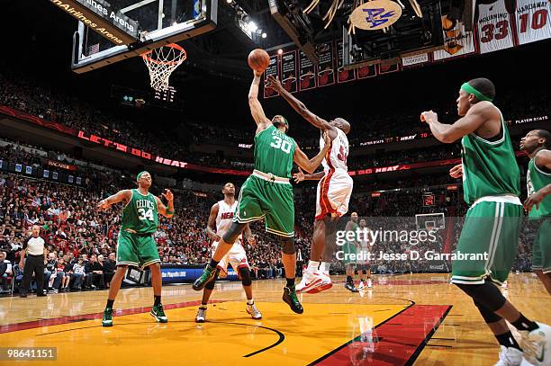 Rasheed Wallace of the Boston Celtics rebounds against Joel Anthony of the Miami Heat in Game Three of the Eastern Conference Quarterfinals during...