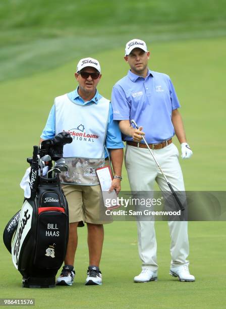 Bill Haas prepares to play a shot on the fifth hole during the first round of the Quicken Loans National at TPC Potomac on June 28, 2018 in Potomac,...