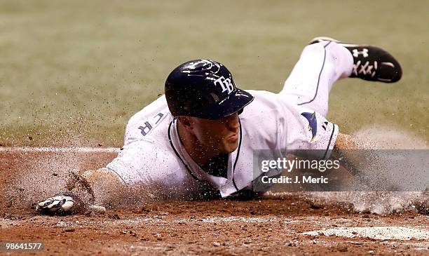 Outfielder Gabe Kapler of the Tampa Bay Rays scores a run against the Toronto Blue Jays during the game at Tropicana Field on April 23, 2010 in St....