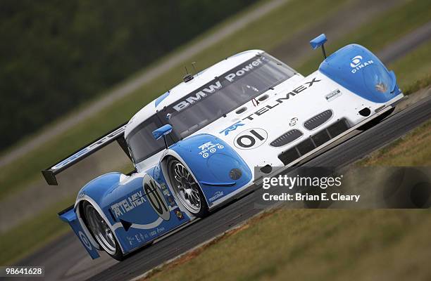 The BMW Riley of Scott Pruett and Memo Rojas races down a straightaway during practice for the Bosch Engineering 250 at Virginia International...