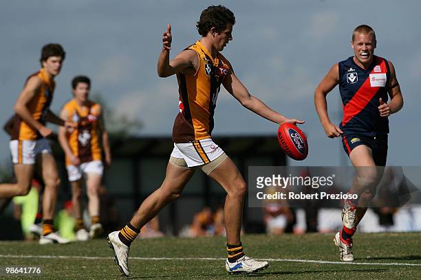 Andrew Renton of the Hawks kicks during the round three VFL match between the Coburg Tigers and the Box Hill Hawks at Highgate Recreation Reserve on...