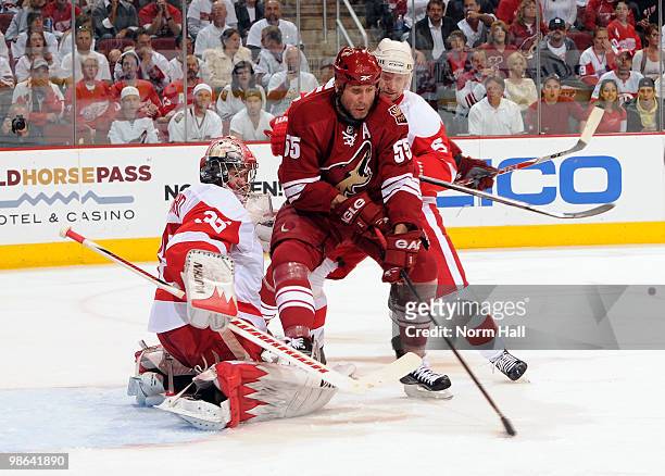Ed Jovanovski of the Phoenix Coyotes gets the puck past Jimmy Howard of the Detroit Red Wings in Game Five of the Western Conference Quarterfinals...