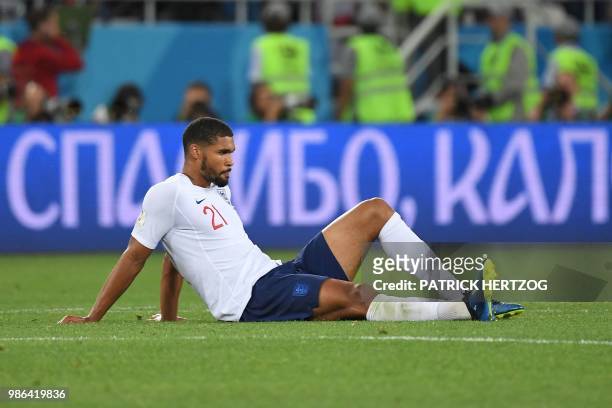 England's midfielder Ruben Loftus-Cheek sits on the ground at the end of the Russia 2018 World Cup Group G football match between England and Belgium...
