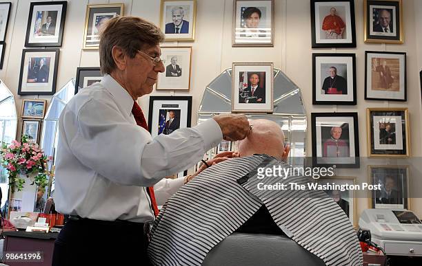 Longtime Dupont Circle neighborhood barber Diego D'Ambrosio worked carefully shaving Steve Levy's head on April 16, 2010 in Washington DC. D'Ambrosio...