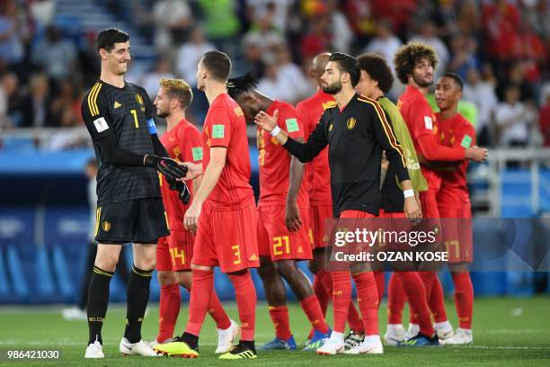 Belgium's players celebrate at the end of the Russia 2018 World Cup Group G football match between England and Belgium at the Kaliningrad Stadium in...