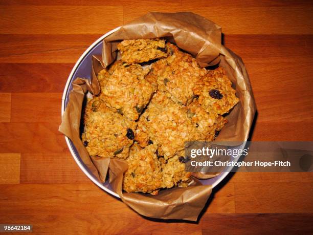 tin of flapjack - christopher hope-fitch stock pictures, royalty-free photos & images