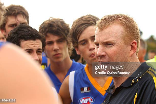 Darren Bewick the coach of the Ranges talks to his players during the round four TAC Cup match between the Eastern Ranges and Dandenong Stingrays at...