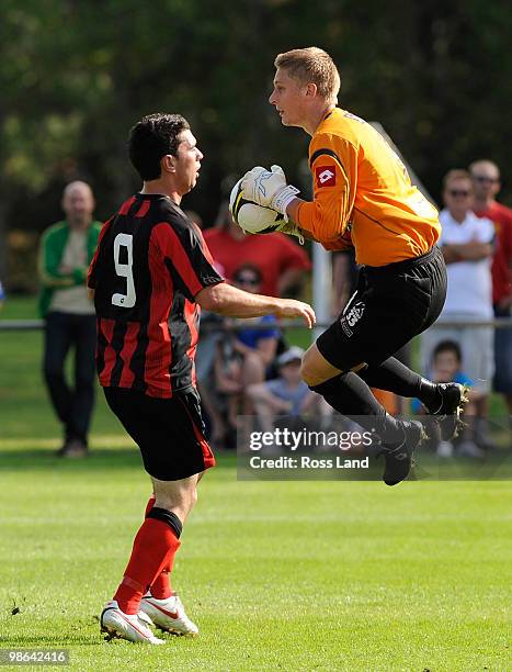 Waitakere United goal keeper Danny Robinson competes with Russell Kamo of Canterbury United during the New Zealand Football Championship Final at...