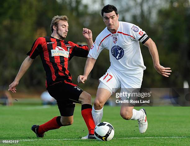 Darren Overton Waitakere United competes with Waitakere United captain Jake Butler during the New Zealand Football Championship Final at Fred Taylor...