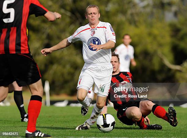 Martin Bullock of Waitakere United competes with Andy Pitman of Canterbury United during the New Zealand Football Championship Final at Fred Taylor...