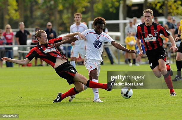 Benjamin Tortori of Waitakere United competes with Matt Boyd of Canterbury United during the New Zealand Football Championship Final at Fred Taylor...