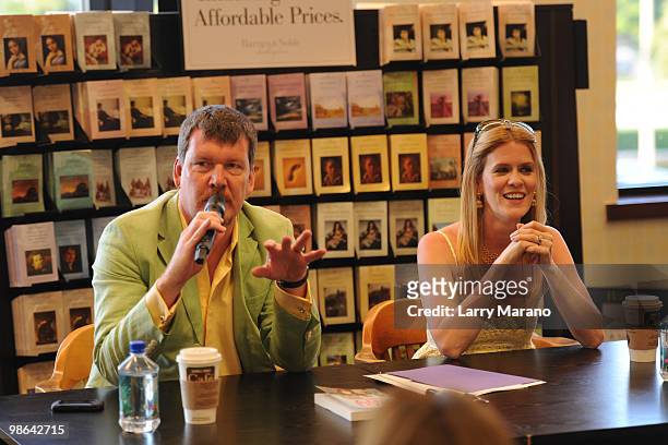 Simon van Kempen and Alex McCord from the cast of "Real Housewives of New York City" sign copies of "Little Kids, Big City" on April 23, 2010 in Boca...