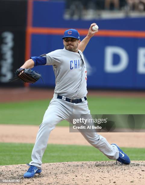 Brian Duensing of the Chicago Cubs pitches against the New York Mets during their game at Citi Field on June 3, 2018 in New York City.