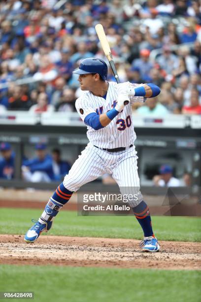 Michael Conforto of the New York Mets bats against the Chicago Cubs during their game at Citi Field on June 3, 2018 in New York City.