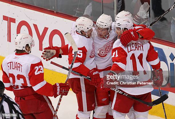 Brad Stuart, Niklas Kronwall, Justin Abdelkader, Drew Miller and Daniel Cleary of the Detroit Red Wings celebrate after Miller scored a first period...