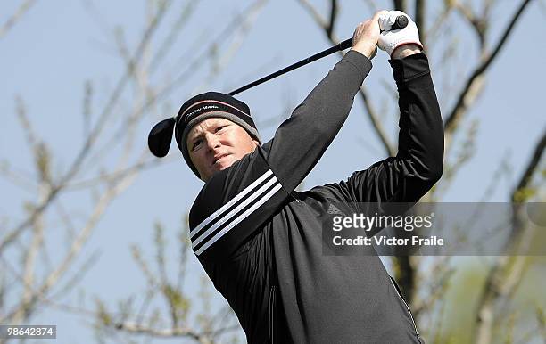 Marcus Fraser of Australia tees off on the 12th hole during the Round Two of the Ballantine's Championship at Pinx Golf Club on April 24, 2010 in...