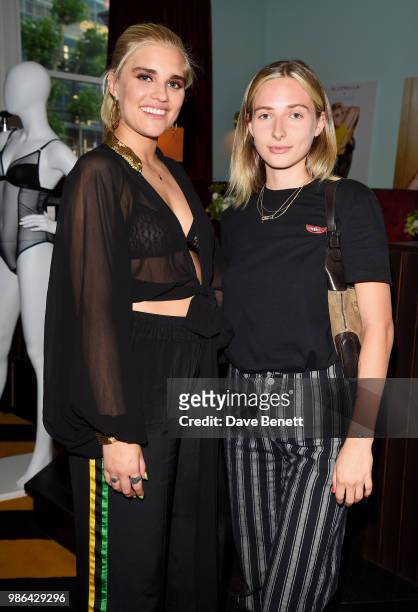 Tigerlily Taylor and Dylan Weller attend Tigerlily Taylor's all girls Bluebella lingerie party at Laylow on June 28, 2018 in London, England.