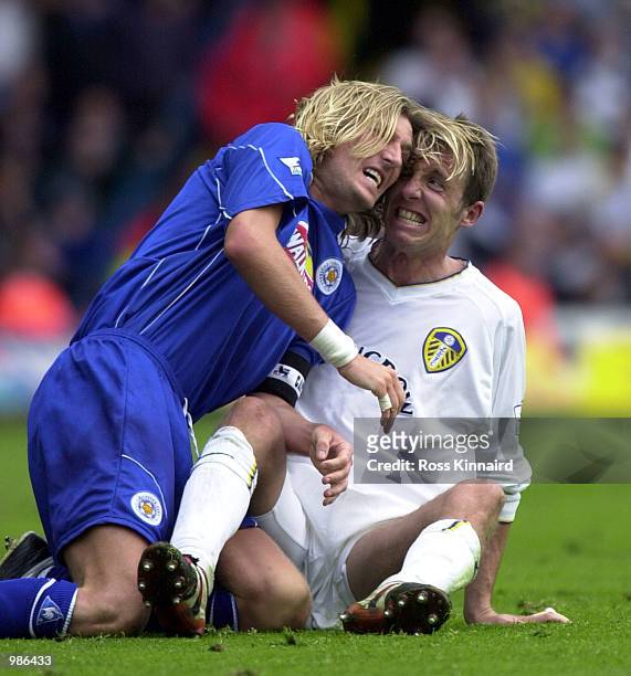 Lee Bowyer of Leeds clashes with Robbie Savage of Leicester during the Leeds United v Leicester City FA Carling Premiership match at Elland Road,...