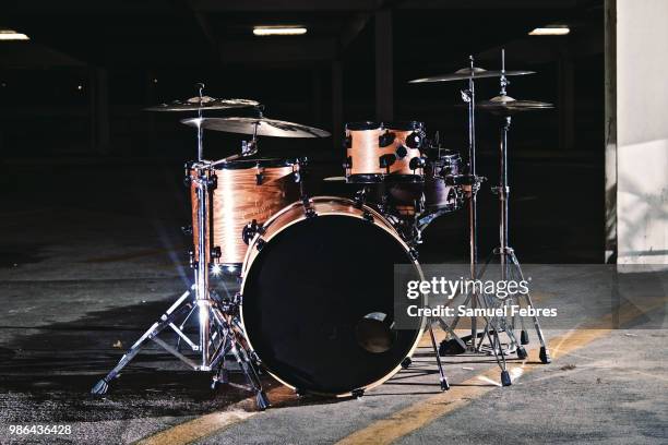 drums in a parking garage - drums stock-fotos und bilder