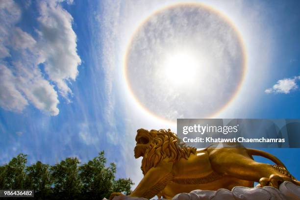 sun with circular rainbow - sun halo - sundog stock pictures, royalty-free photos & images