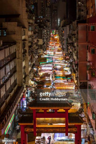 temple street night market in hong kong. - temple street market stock pictures, royalty-free photos & images