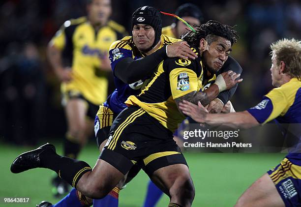 Ma'a Nonu of the Hurricanes attacks the Highlander's defence during the round 11 Super 14 match between the Highlanders and the Hurricanes at...