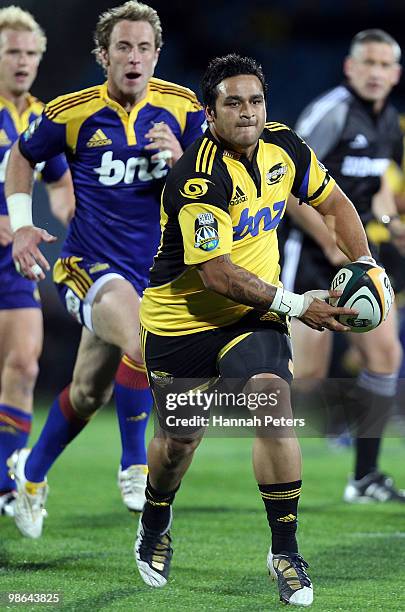 Piri Weepu of the Hurricanes looks to pass the ball out during the round 11 Super 14 match between the Highlanders and the Hurricanes at Carisbrook...