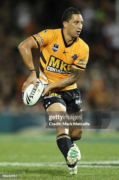 Benji Marshall of the Tigers passes the ball during the round seven NRL match between the Penrith Panthers and the Wests Tigers at CUA Stadium on...