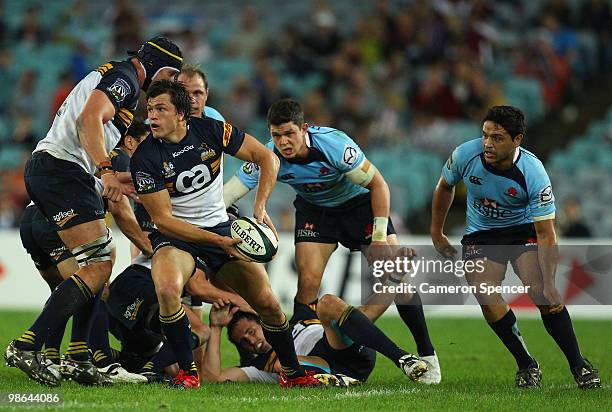 Adam Ashley-Cooper of the Brumbies passes the ball during the round 11 Super 14 match between the Waratahs and the Brumbies at ANZ Stadium on April...