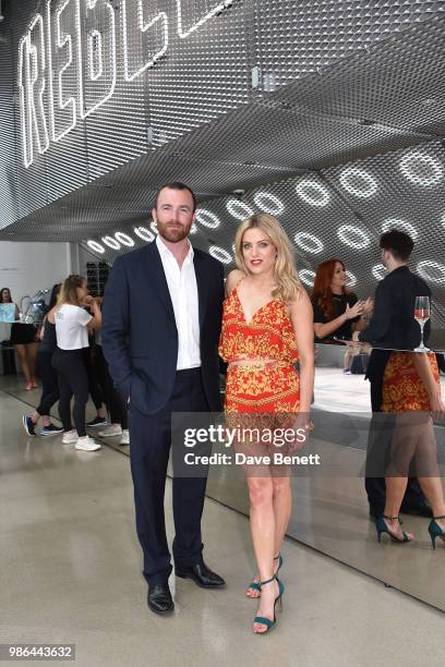James Balfour and Olivia Cox attend The Ride Of Your Life 'Detox to Retox' Evening on June 28, 2018 in London, England.