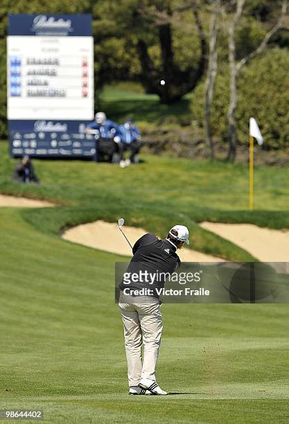 Marcus Fraser of Australia plays his approach shot on the 9th hole during the Round Two of the Ballantine's Championship at Pinx Golf Club on April...