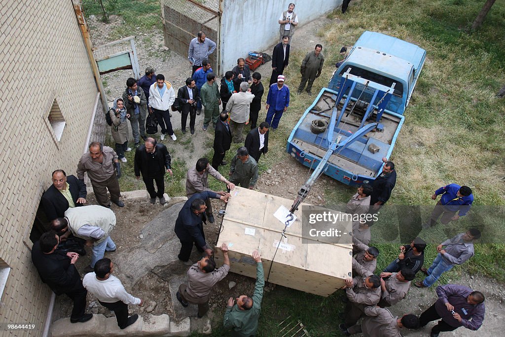 Iranian workers deliver one of two Siber