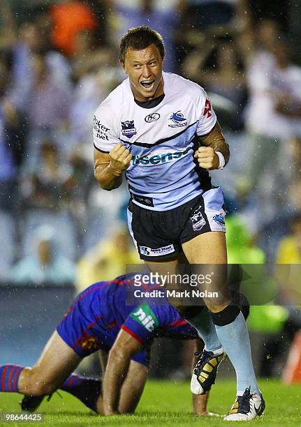 Tim Smith of the Sharks celebrates his try during the round seven NRL match between the Cronulla Sharks and the Newcastle Knights at Toyota Stadium...