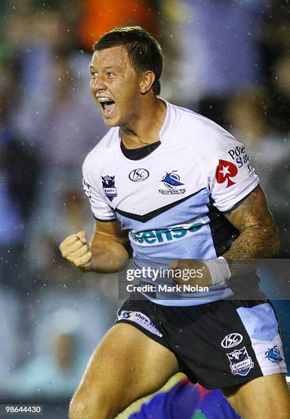 Tim Smith of the Sharks celebrates his try during the round seven NRL match between the Cronulla Sharks and the Newcastle Knights at Toyota Stadium...