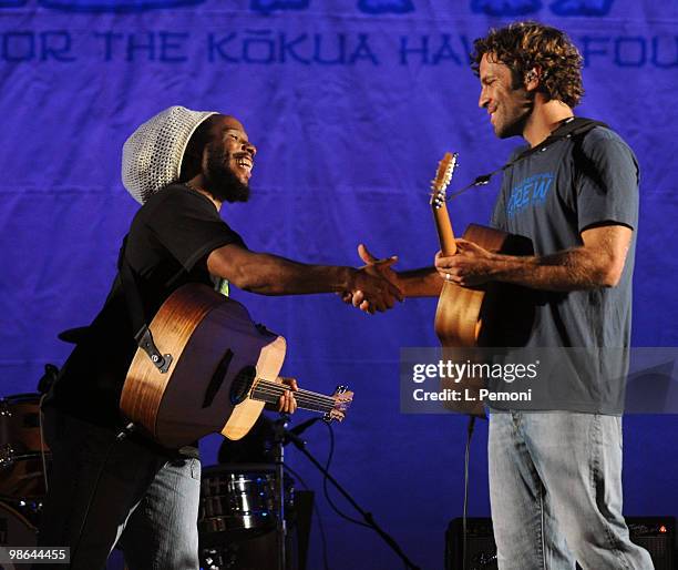 Ziggy Marley and Jack Johnson shake hands after performing together at the Kokua Festival 2010 on April 23, 2010 in Honolulu, Hawaii.